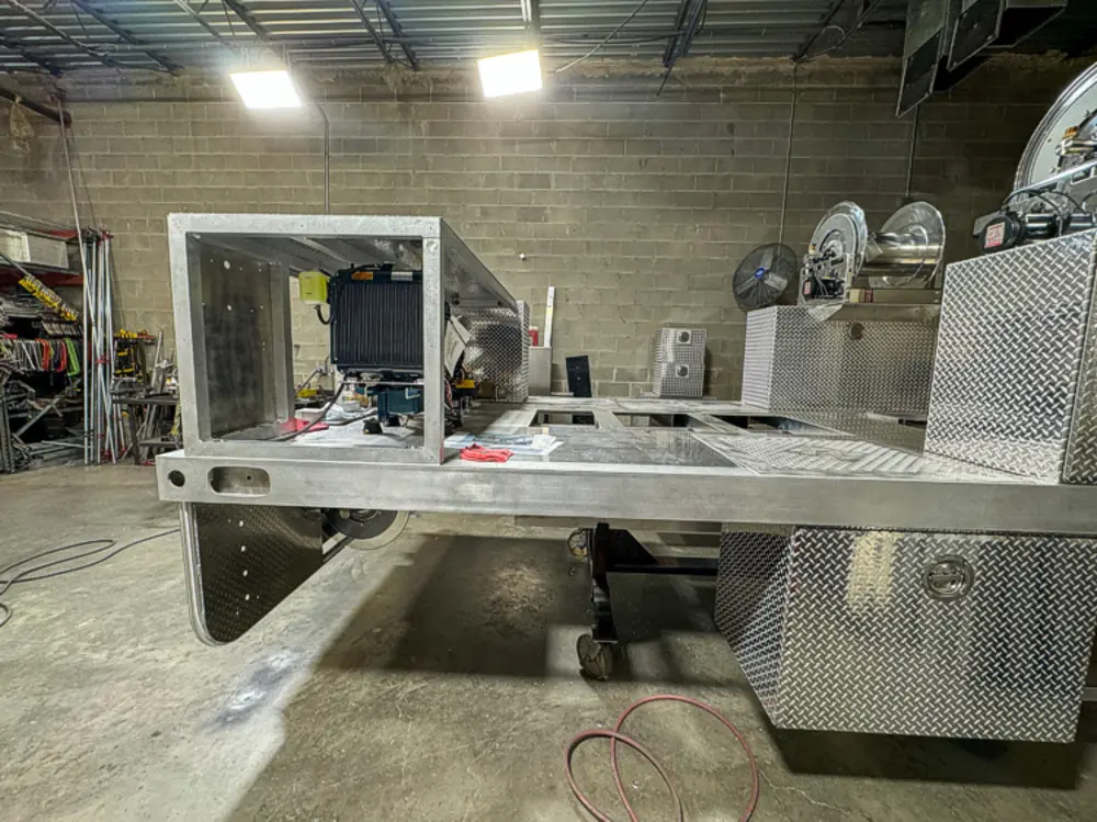 Open compartment interior during fabrication, photo 144 of 303.